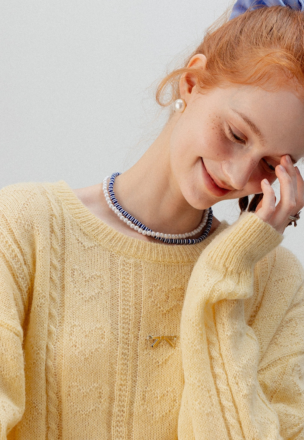 Women's Cropped Cable Knit Sweater with Bow Detail