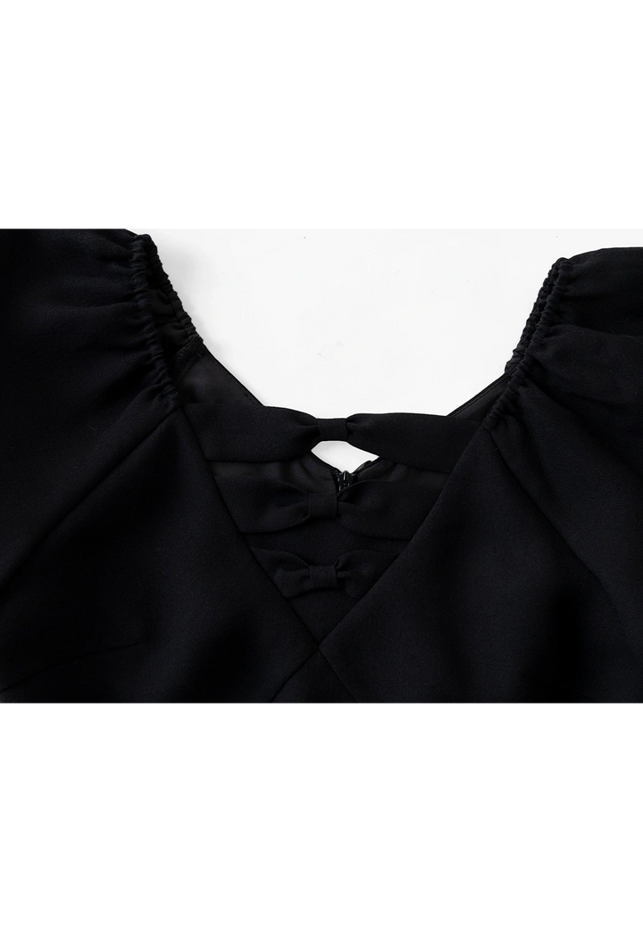 Damenkleid mit Puffärmeln und Schleife am Rücken